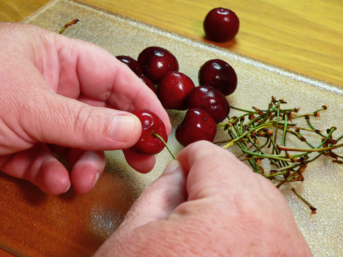 Remove the stems from the cherries. Yes, you have to do this one at a time.