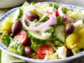 Platter of Greek salad with feta vinaigrette