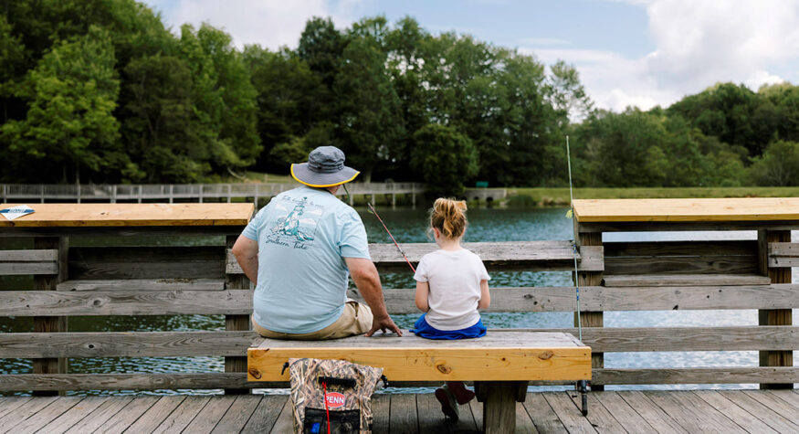 Father and daughter fishing at Lake Coffey