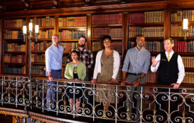 Tour goers visit the Library at Biltmore Estate