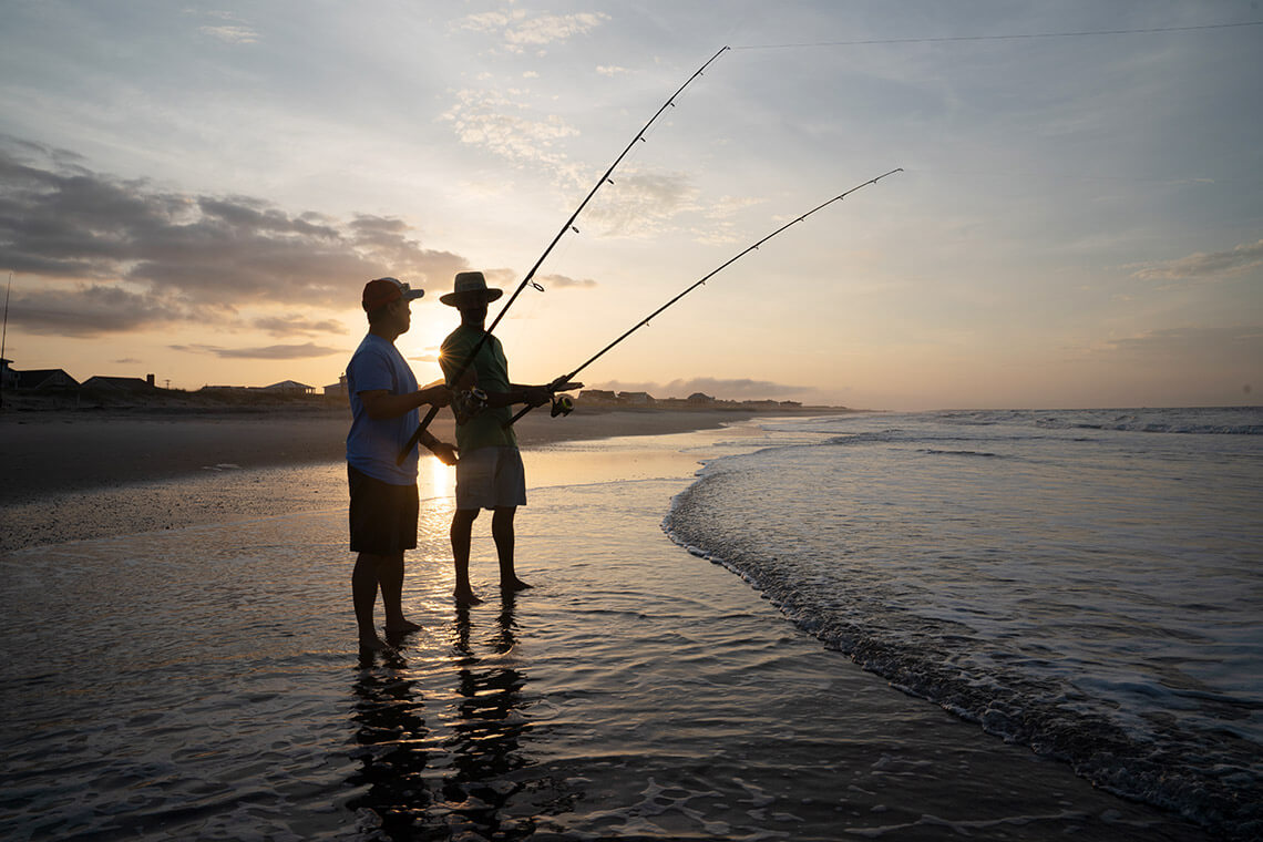 People surf fishing at Emerald Isle Beach, NC