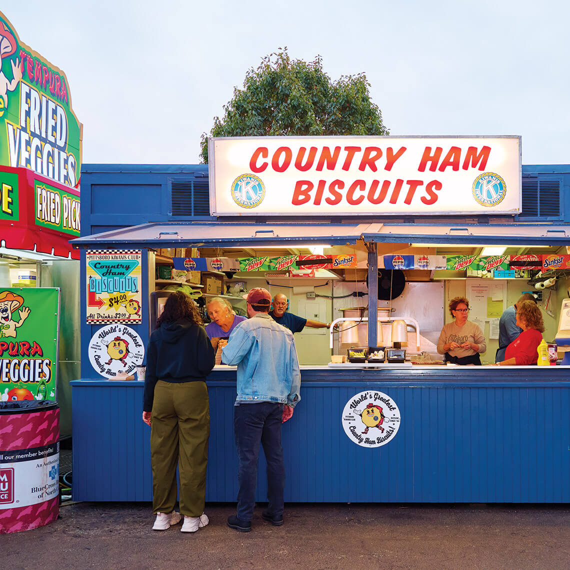 Visitors grab ham biscuits at the North Carolina State Fair