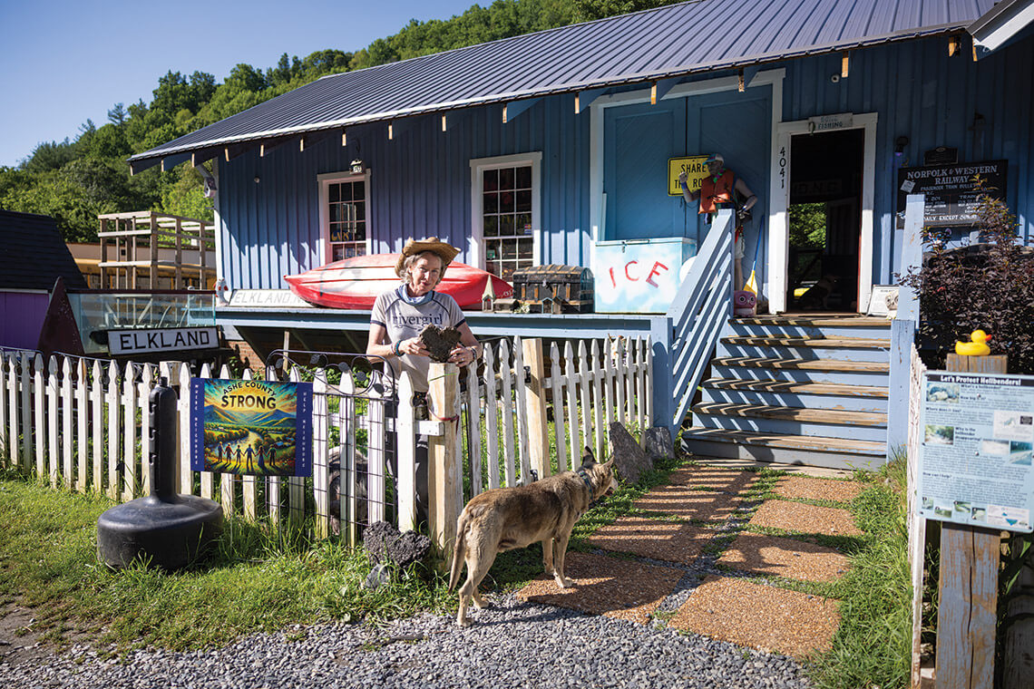 Kelly McCoy and her dog outside of their house