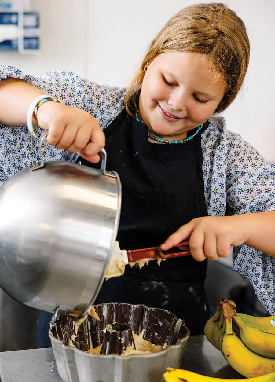 Meadow Withington prepares banana bread