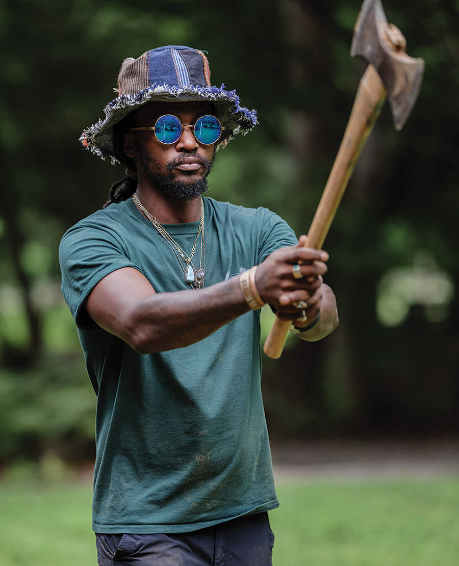 Adrian Houston throwing an axe