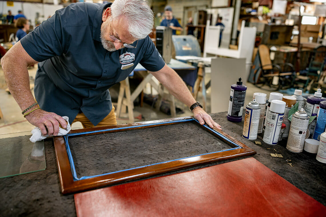 Bernard Mumford restores a wooden frame