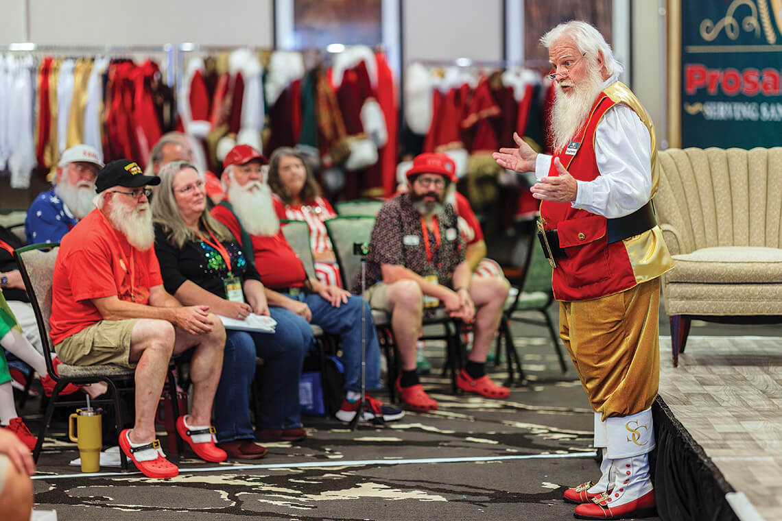 Doug Eberhart speaks to a room of men in the Advanced Santa Studies Class