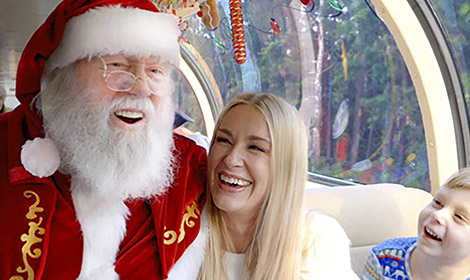 Santa, woman, and child