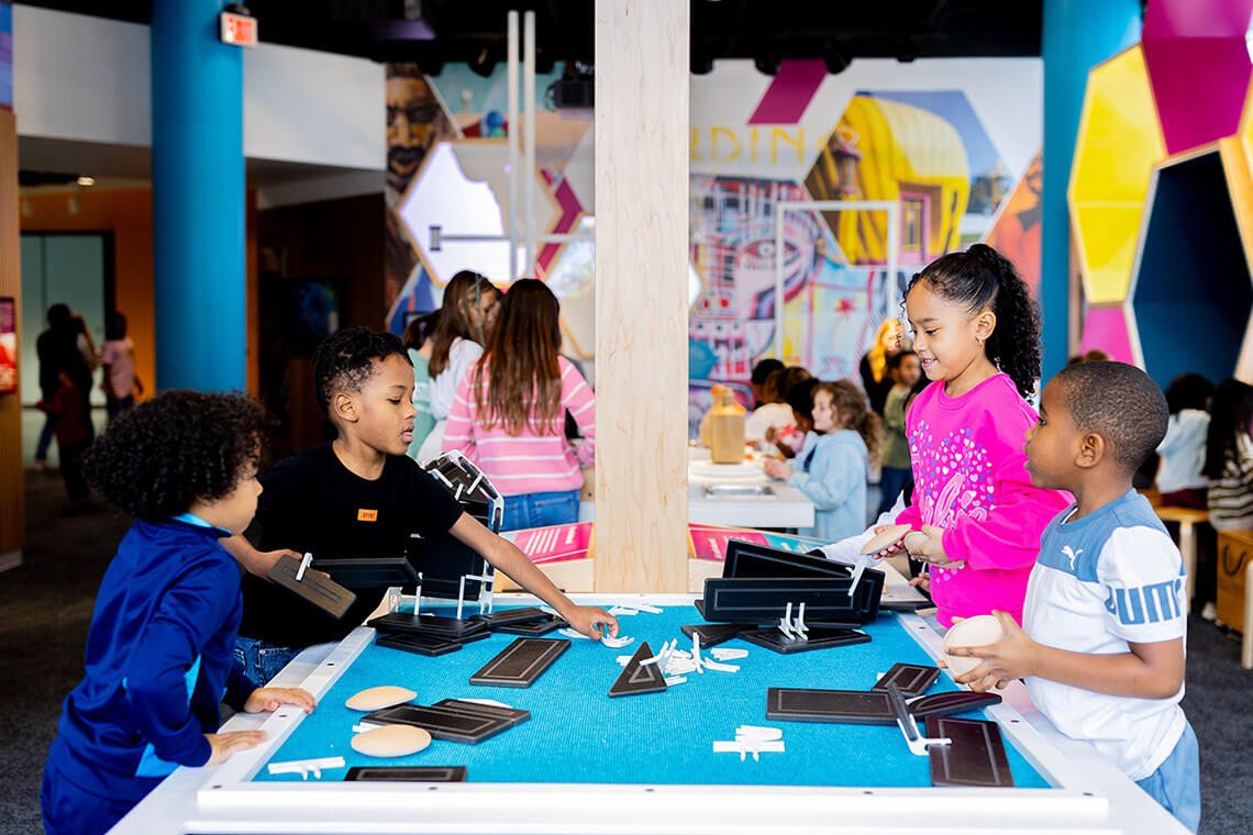 Children at the By Design exhibit