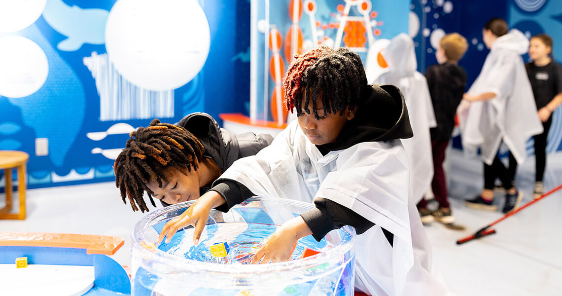 Children try hands-on exhibits at Kaleideum