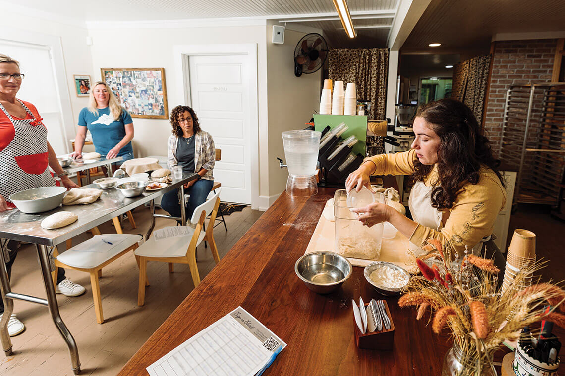 Castellano leads a breadbaking class