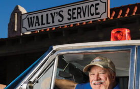 Mike Cockerham in his vintage squad car
