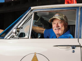Mike Cockerham in his vintage squad car