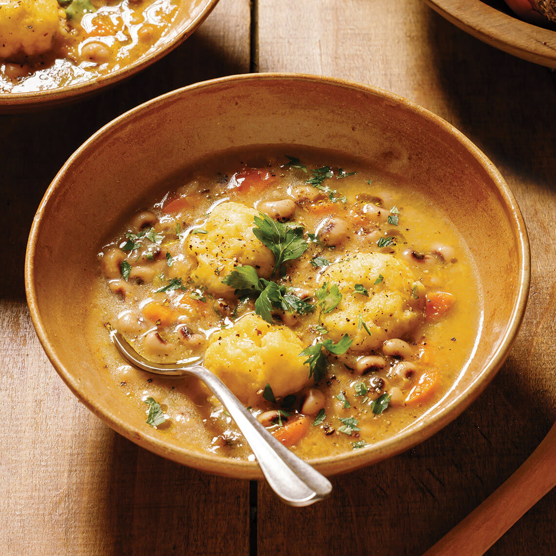 Bowl of field pea and dumpling soup