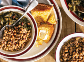 Bowl of field peas, cornbread, and collard greens on the table