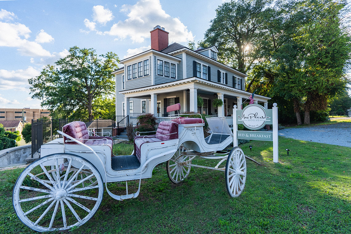 The MacPherson House Bed & Breakfast with a carriage out front