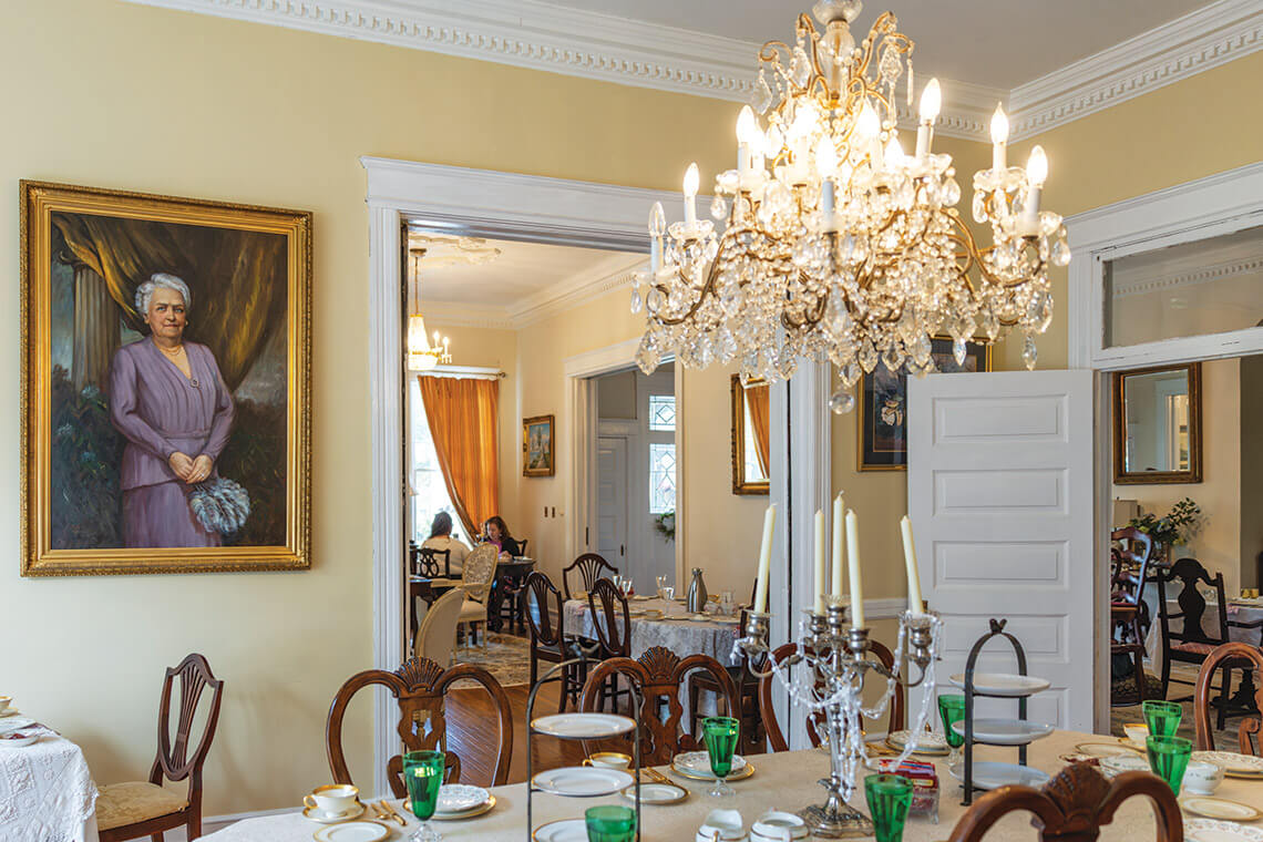 Dining room set for tea at the Royster House