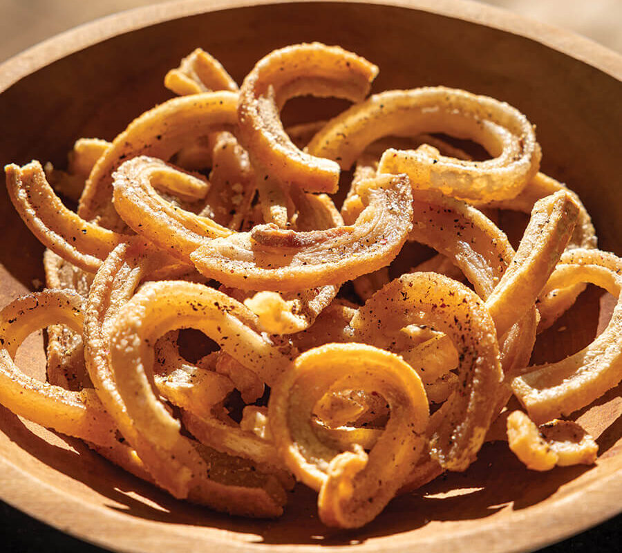 Curls of cooked fatback